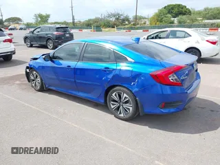 2018 Honda Civic EX-T z VIN JHMFC1F31JX018152, wystawiony jako IAAI lot #41935394 z przebiegiem 60 333 mil mil oraz . Historia ofert i sprzedaży dostępna na DreamBid. Obrazek 3.