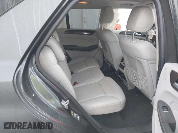2014 Mercedes-Benz M 350 with VIN 4JGDA2EB2EA307963, listed as a IAAI auction lot 41582162 with 54,963 mi miles and . Bid and sale history available at DreamBid. Image 8.