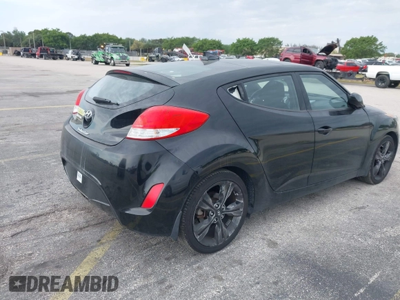 2017 Hyundai Veloster Value Edition with VIN KMHTC6AD9HU317347, listed as a IAAI auction lot 41800746 with 32,550 mi miles. Bid and sale history available at carsss.com. Image 4.
