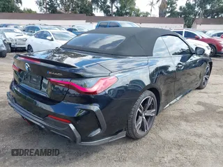 2023 BMW 4 Series M440i with VIN WBA53AT09PCL49954, listed as a IAAI auction lot 41478951 with 27,105 mi miles and . Bid and sale history available at DreamBid. Image 4.