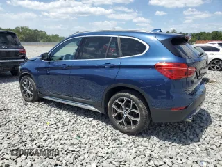 2021 BMW X1 sDrive28i z VIN WBXJG7C06M5S00879, wystawiony jako Copart lot #55572445 z przebiegiem 28 252 mil mil oraz Tytuł czysty. Historia ofert i sprzedaży dostępna na DreamBid. Obrazek 2.