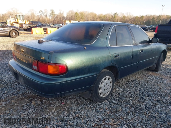 1996 Toyota Camry DX with VIN JT2BG12K2T0416797, listed as a IAAI auction lot 41789017 with 312,858 mi miles. Bid and sale history available at carsss.com. Image 4.
