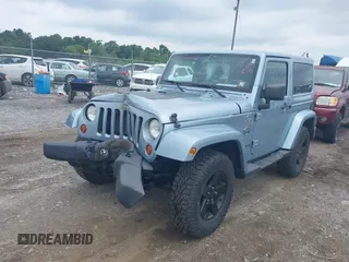 2012 Jeep Wrangler Arctic with VIN 1C4AJWBG7CL148325, listed as a IAAI auction lot 39943602 with 86,625 mi miles and . Bid and sale history available at DreamBid. Image 2.