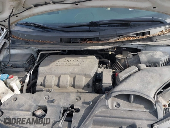 2014 Honda Odyssey LX with VIN 5FNRL5H24EB001551, listed as a IAAI auction lot 41879040 with 119,200 mi miles and . Bid and sale history available at DreamBid. Image 10.