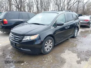2016 Honda Odyssey EX-L with VIN 5FNRL5H68GB150485, listed as a IAAI auction lot 41835927 with 97,765 mi miles. Bid and sale history available at carsss.com. Image 2.