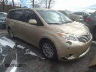 2011 Toyota Sienna XLE with VIN 5TDDK3DC3BS029476, listed as a IAAI auction lot 41393568 with 124,328 mi miles. Bid and sale history available at carsss.com. Image 1.
