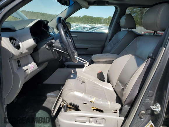 2012 Honda Pilot EX-L with VIN 5FNYF3H55CB023816, listed as a Copart auction lot 49869225 with 275,001 mi miles and Salvage Title. Bid and sale history available at DreamBid. Image 7.