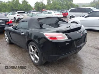 2009 Saturn Sky z VIN 1G8MN35B59Y104152, wystawiony jako IAAI lot #42308236 z przebiegiem 190 823 mil mil oraz . Historia ofert i sprzedaży dostępna na DreamBid. Obrazek 3.