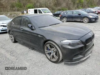 2013 BMW M5 z VIN WBSFV9C54DD095421, wystawiony jako Copart lot #53492515 z przebiegiem Nie podano mil oraz Szkoda całkowita • Salvage title. Historia ofert i sprzedaży dostępna na DreamBid. Obrazek 4.