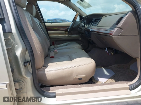 2004 Mercury Grand Marquis LS Premium z VIN 2MEFM75WX4X607033, wystawiony jako IAAI lot #42332543 z przebiegiem 179 297 mil mil oraz . Historia ofert i sprzedaży dostępna na DreamBid. Obrazek 5.