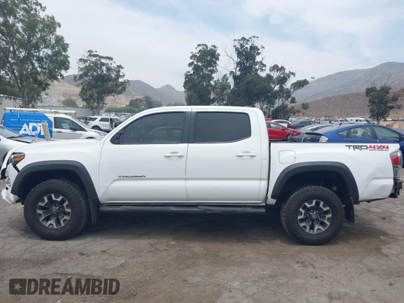 2023 Toyota Tacoma SR with VIN 3TMCZ5AN1PM556299, listed as a IAAI auction lot 42344160 with 42,338 mi miles and . Bid and sale history available at DreamBid. Image 15.