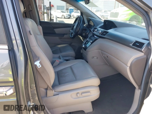 2011 Honda Odyssey EX-L with VIN 5FNRL5H64BB070836, listed as a IAAI auction lot 42520878 with 162,316 mi miles and . Bid and sale history available at DreamBid. Image 5.