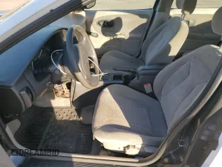 2001 Saturn SL z VIN 1G8ZK52771Z219294, wystawiony jako Copart lot #83155494 z przebiegiem 190 338 mil mil oraz Szkody całkowita. Historia ofert i sprzedaży dostępna na DreamBid. Obrazek 7.
