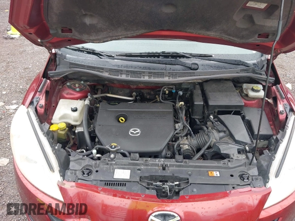 2012 Mazda 5 Grand Touring with VIN JM1CW2DLXC0134997, listed as a IAAI auction lot 42360574 with 230,951 mi miles and . Bid and sale history available at DreamBid. Image 10.