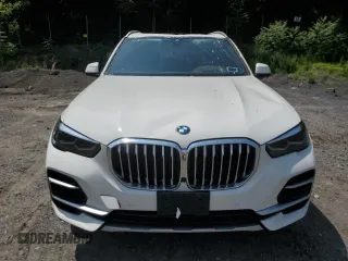 2023 BMW X5 xDrive40i with VIN 5UXCR6C03P9P75351, listed as a Copart auction lot 61465655 with 24,883 mi miles and Salvage title. Bid and sale history available at DreamBid. Image 5.