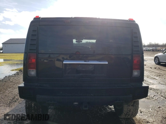 2005 Hummer H2 SUV with VIN 5GRGN23U35H111403, listed as a Copart auction lot 84720994 with 142,159 mi miles and Salvage Title. Bid and sale history available at carsss.com. Image 6.