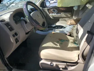 2005 Mercury Mariner Luxury z VIN 4M2CU56125DJ17538, wystawiony jako Copart lot #46948345 z przebiegiem 158 277 mil mil oraz Szkoda całkowita • Salvage title. Historia ofert i sprzedaży dostępna na DreamBid. Obrazek 7.