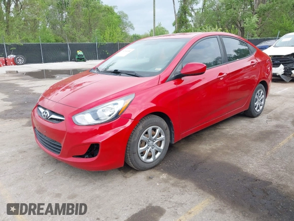 2014 Hyundai Accent GLS with VIN KMHCT4AEXEU600395, listed as a IAAI auction lot 42141052 with 172,284 mi miles. Bid and sale history available at carsss.com. Image 2.