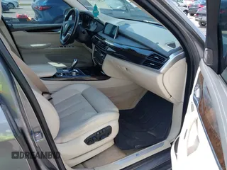 2016 BMW X5 xDrive40e with VIN 5UXKT0C58G0S75938, listed as a IAAI auction lot 42021138 with 97,426 mi miles and . Bid and sale history available at DreamBid. Image 5.