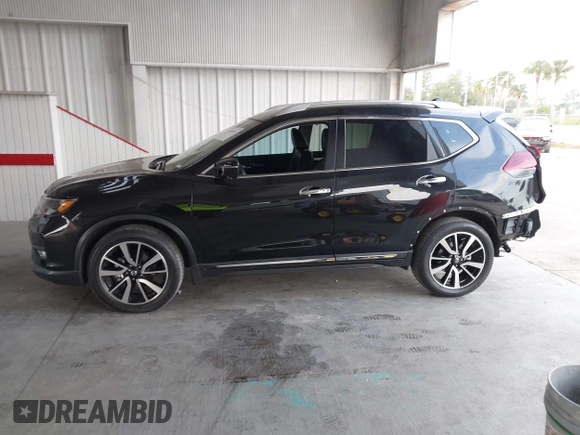 2019 Nissan Rogue SV with VIN 5N1AT2MTXKC809627, listed as a IAAI auction lot 40705533 with 28,463 mi miles and . Bid and sale history available at DreamBid. Image 14.