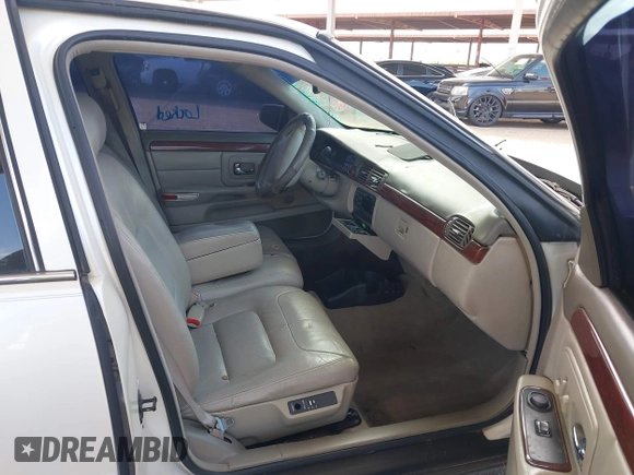 1999 Cadillac DeVille z VIN 1G6KD54YXXU794294, wystawiony jako IAAI lot #42141931 z przebiegiem 161 408 mil mil oraz . Historia ofert i sprzedaży dostępna na DreamBid. Obrazek 5.