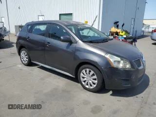 2009 Pontiac Vibe 1SB with VIN 5Y2SP67049Z458291, listed as a Copart auction lot 63234065 with 217,986 mi miles and Salvage title. Bid and sale history available at DreamBid. Image 4.