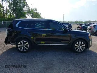 2021 Kia Telluride EX z VIN 5XYP34HC4MG170731, wystawiony jako IAAI lot #42363928 z przebiegiem 49 564 mil mil oraz . Historia ofert i sprzedaży dostępna na DreamBid. Obrazek 13.