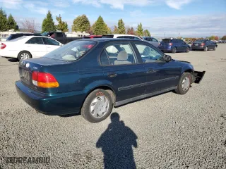 1996 Honda Civic DX with VIN 2HGEJ6621TH519154, listed as a Copart auction lot 74408604 with 91,443 mi miles and Salvage Title. Bid and sale history available at carsss.com. Image 3.