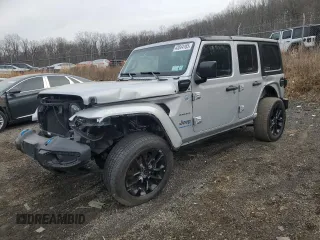 2023 Jeep Wrangler Sahara with VIN 1C4JJXP6XPW630393, listed as a Copart auction lot 43544165 with 39,126 mi miles and Salvage Title. Bid and sale history available at DreamBid. Image 1.