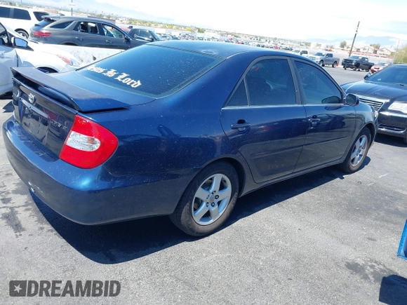 2003 Toyota Camry LE with VIN JTDBE32K130243265, listed as a IAAI auction lot 42145871 with Not Provided miles and . Bid and sale history available at DreamBid. Image 4.