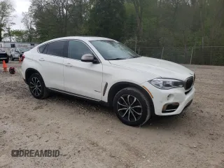 2015 BMW X6 xDrive35i z VIN 5UXKU2C58F0N77172, wystawiony jako Copart lot #55631415 z przebiegiem 246 622 mil mil oraz Tytuł czysty. Historia ofert i sprzedaży dostępna na DreamBid. Obrazek 4.