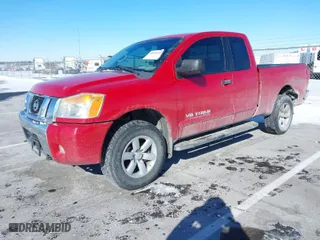 2012 Nissan Titan SV with VIN 1N6BA0CCXCN331040, listed as a IAAI auction lot 41592690 with 149,530 mi miles. Bid and sale history available at carsss.com. Image 2.