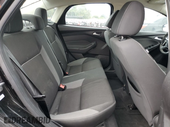 2013 Ford Focus SE z VIN 1FADP3F20DL335132, wystawiony jako Copart lot #61042315 z przebiegiem 149 443 mil mil oraz Czysty tytuł • Clean title. Historia ofert i sprzedaży dostępna na DreamBid. Obrazek 10.