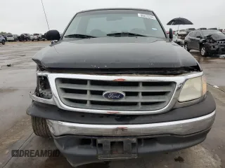 2000 Ford F-150 XL with VIN 3FTZF1728YMA63732, listed as a Copart auction lot 80010344 with Not provided miles and Salvage title. Bid and sale history available at DreamBid. Image 5.