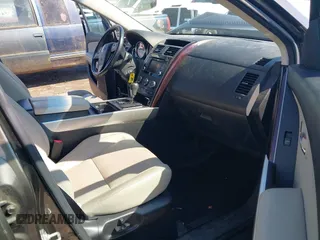 2015 Mazda CX-9 Grand Touring z VIN JM3TB3DV8F0465155, wystawiony jako IAAI lot #42366636 z przebiegiem 125 407 mil mil oraz . Historia ofert i sprzedaży dostępna na DreamBid. Obrazek 5.