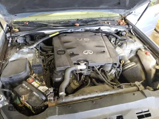 2002 Infiniti Q45 z VIN JNKBF01A62M002926, wystawiony jako Copart lot #73206924 z przebiegiem Nie podano mil oraz Szkody całkowita. Historia ofert i sprzedaży dostępna na DreamBid. Obrazek 11.