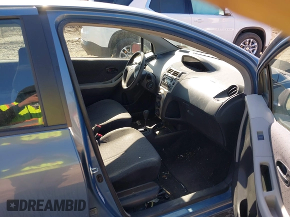 2010 Toyota Yaris with VIN JTDKT4K3XA5282294, listed as a IAAI auction lot 41856423 with 264,409 mi miles. Bid and sale history available at carsss.com. Image 5.