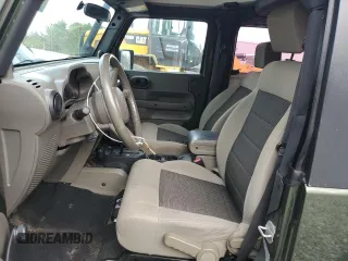 2008 Jeep Wrangler X with VIN 1J4FA24188L638183, listed as a Copart auction lot 56112955 with 112,438 mi miles and Salvage title. Bid and sale history available at DreamBid. Image 7.