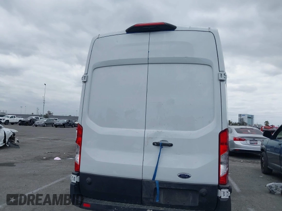 2020 Ford Transit Cargo with VIN 1FTBW3XG2LKB18281, listed as a IAAI auction lot 42022187 with 84,323 mi miles. Bid and sale history available at carsss.com. Image 16.
