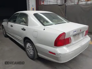 1999 Mitsubishi Diamante z VIN 6MMAP47P4XT003895, wystawiony jako IAAI lot #41992452 z przebiegiem 170 964 mil mil oraz . Historia ofert i sprzedaży dostępna na DreamBid. Obrazek 3.