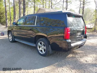 2015 Chevrolet Suburban LT with VIN 1GNSKJKC0FR238524, listed as a IAAI auction lot 42046889 with 179,676 mi miles. Bid and sale history available at carsss.com. Image 3.