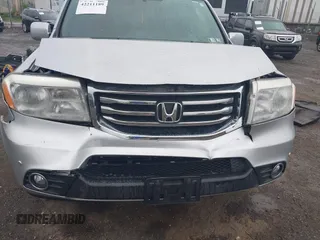 2013 Honda Pilot Touring z VIN 5FNYF4H96DB051005, wystawiony jako IAAI lot #42211189 z przebiegiem 215 594 mil mil oraz . Historia ofert i sprzedaży dostępna na DreamBid. Obrazek 6.