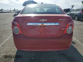 2012 Chevrolet Sonic LT with VIN 1G1JC5SH2C4219849, listed as a Copart auction lot 52643885 with 173,119 mi miles and Salvage title. Bid and sale history available at DreamBid. Image 6.