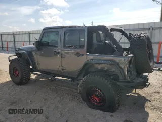 2016 Jeep Wrangler Unlimited Rubicon with VIN 1C4BJWFG8GL192077, listed as a Copart auction lot 58339005 with 62,076 mi miles and Salvage title. Bid and sale history available at DreamBid. Image 2.