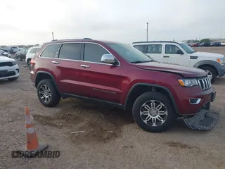 2017 Jeep Grand Cherokee Altitude with VIN 1C4RJEAG2HC671919, listed as a IAAI auction lot 41959542 with 157,104 mi miles and . Bid and sale history available at DreamBid. Image 1.