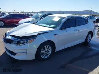 2018 Kia Optima LX with VIN KNAGT4L37J5202502, listed as a IAAI auction lot 41819087 with 73,311 mi miles. Bid and sale history available at carsss.com. Image 2.