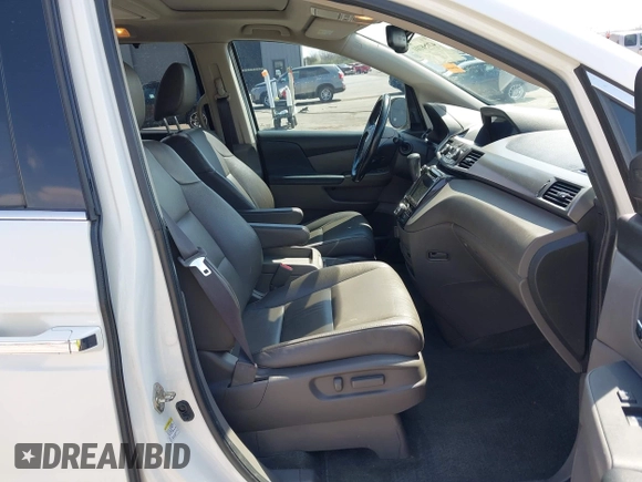 2016 Honda Odyssey Touring Elite with VIN 5FNRL5H97GB044278, listed as a IAAI auction lot 42056101 with 182,396 mi miles and . Bid and sale history available at DreamBid. Image 5.
