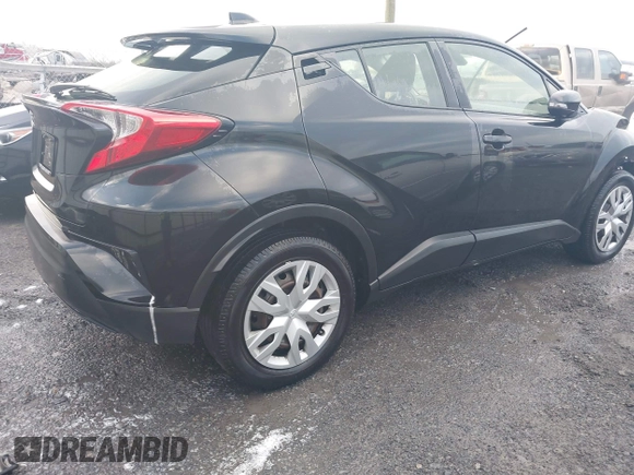 2020 Toyota C-HR LE with VIN JTNKHMBX3L1073585, listed as a IAAI auction lot 41207535 with 167,925 mi miles. Bid and sale history available at carsss.com. Image 4.