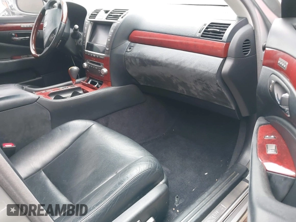 2012 Lexus LS 460 with VIN JTHCL5EF0C5014758, listed as a IAAI auction lot 41627475 with 154,717 mi miles and . Bid and sale history available at DreamBid. Image 5.