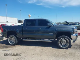 2018 Chevrolet Silverado 1500 LT with VIN 3GCPCREC1JG127396, listed as a IAAI auction lot 41790850 with 138,725 mi miles and . Bid and sale history available at DreamBid. Image 14.
